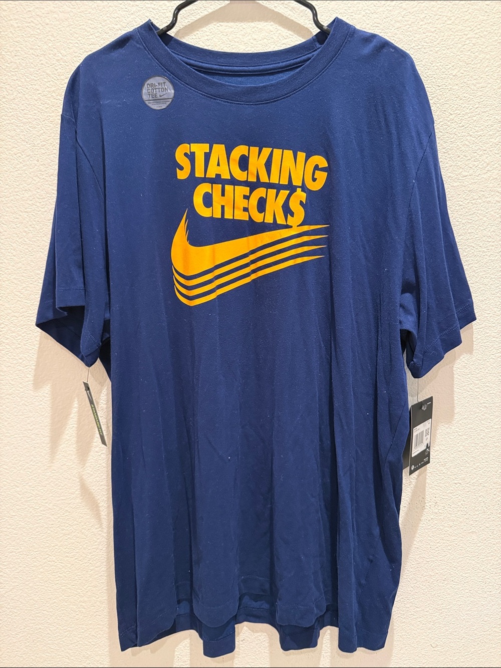 Nike Men’s Navy Blue Graphic Tee with Yellow Swoosh